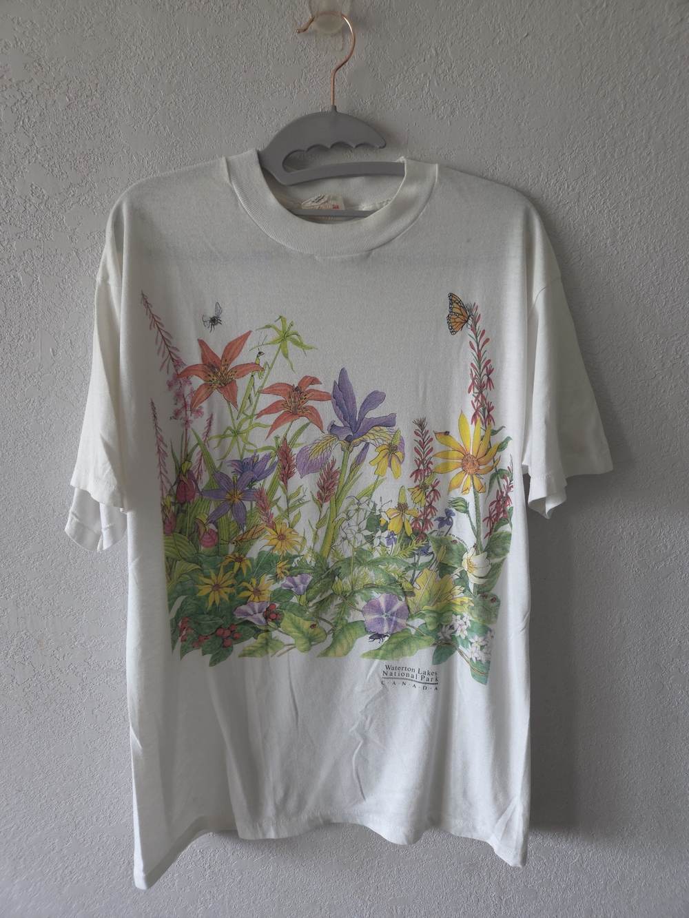 Vintage White Tee with Multicolor Floral Meadow Graphic